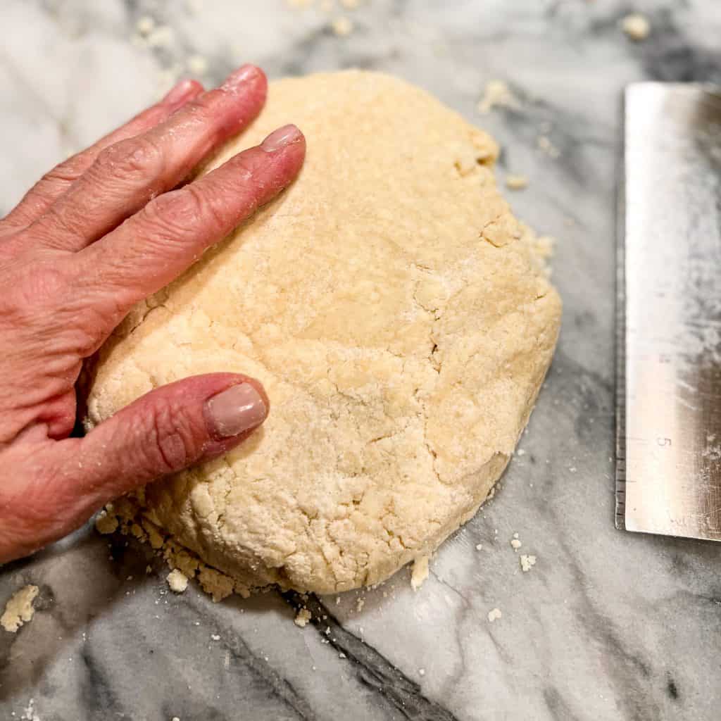 Pie dough on marble.